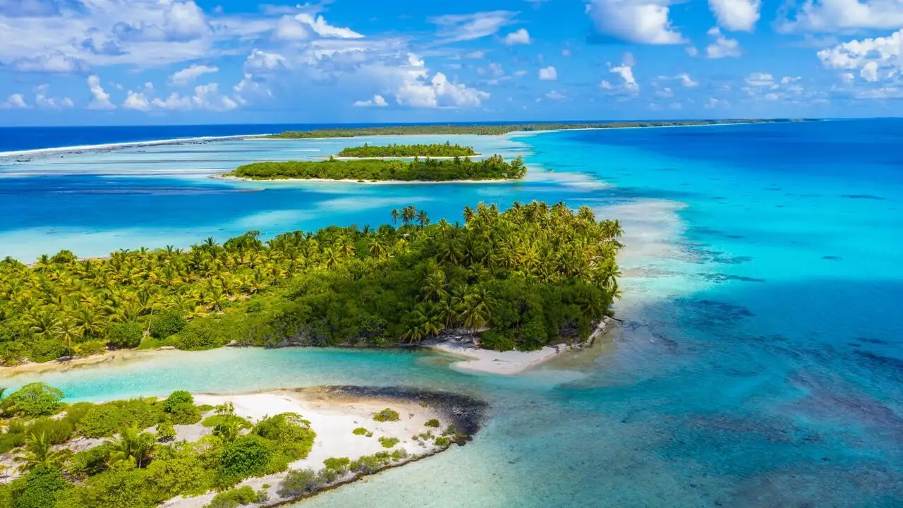 Tuamotu sauvages - Une oasis dans le bleu – image d’arrière-plan